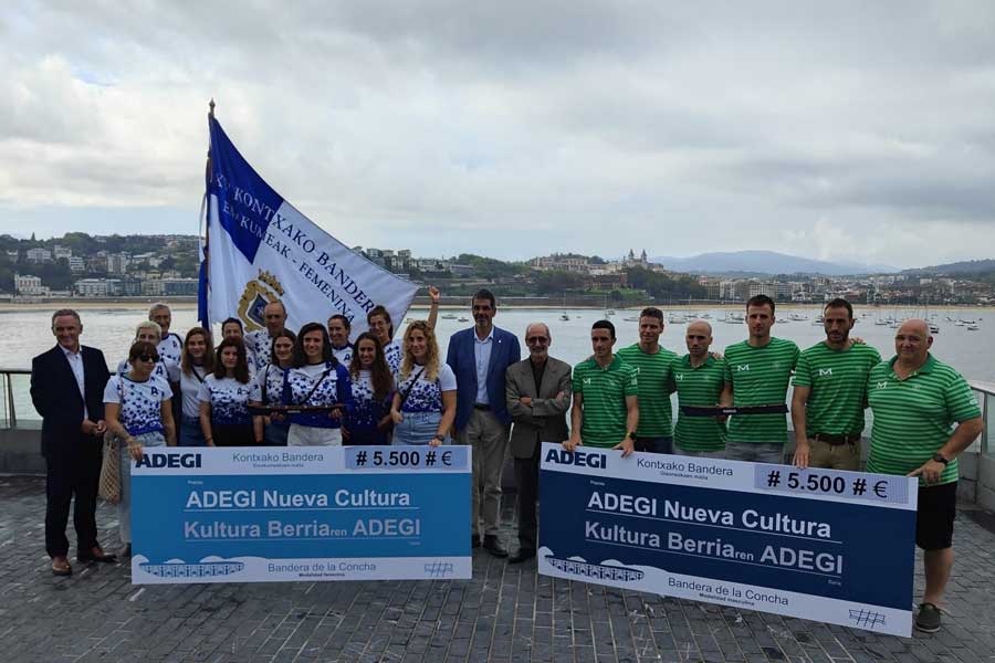 Representantes de los dos clubs premiados