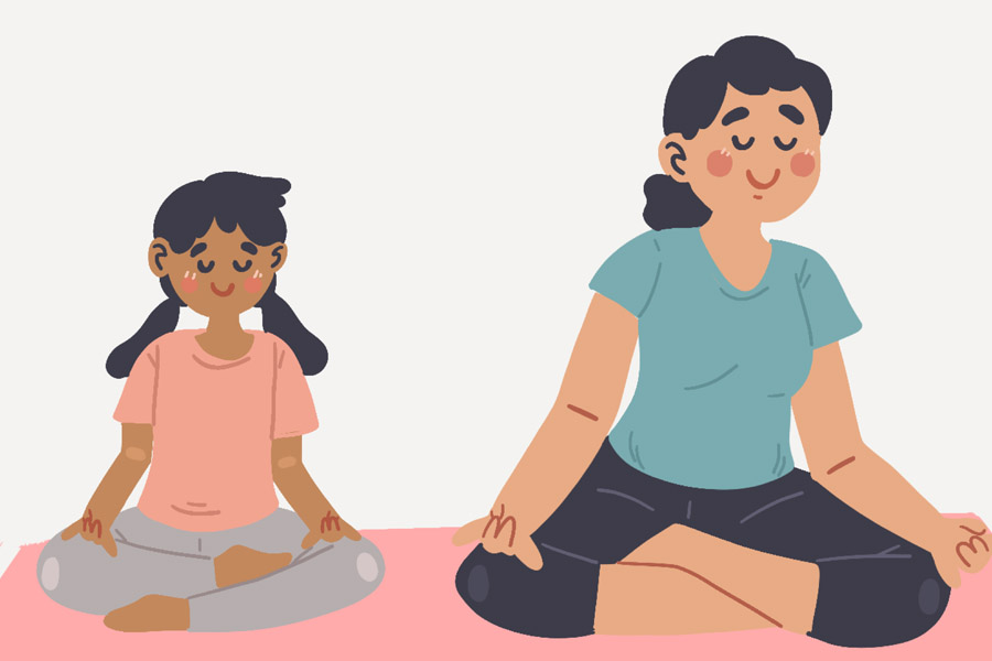 mujer y niño haciendo yoga