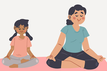 mujer y niño haciendo yoga